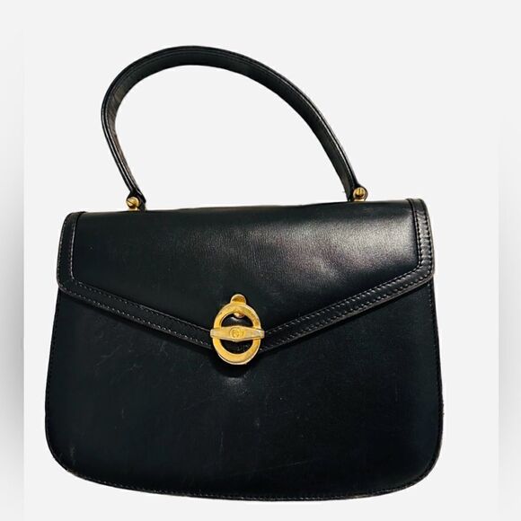 Classic vintage design in leather with gold-tone hardware - Picture 4 of 13